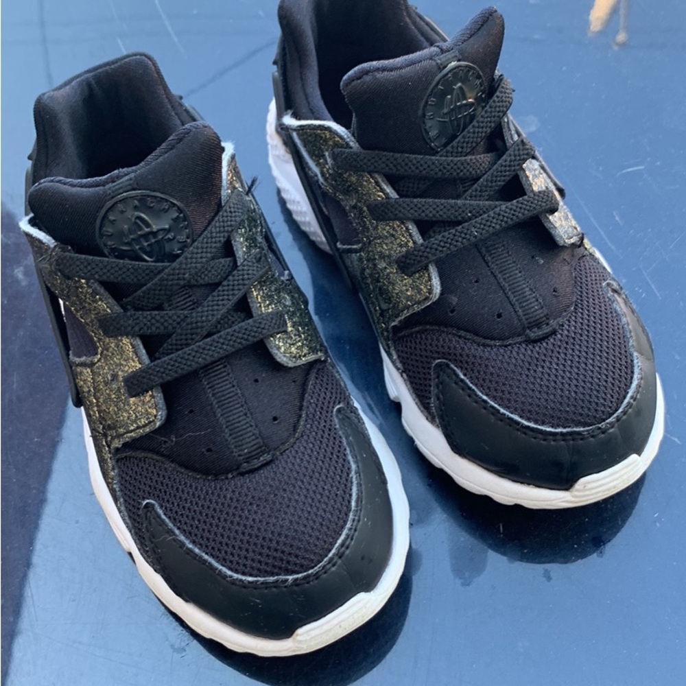 Nike Kids Black Sneakers with Gold Details